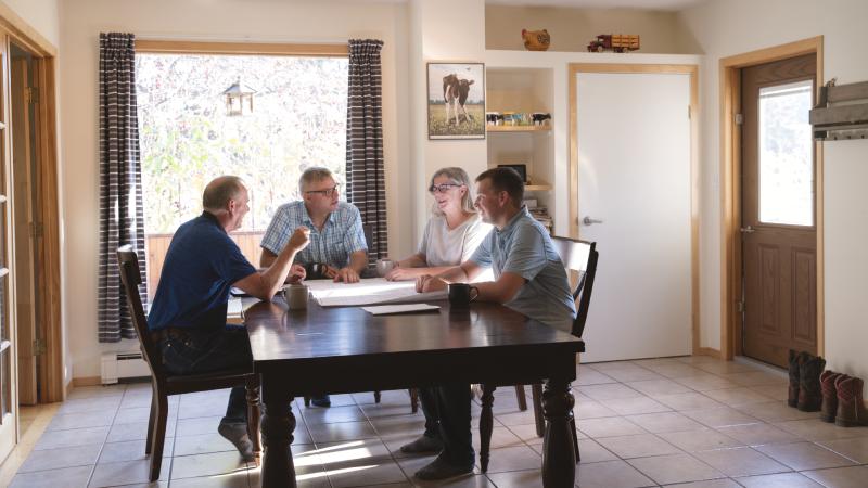 4 people are having a meeting