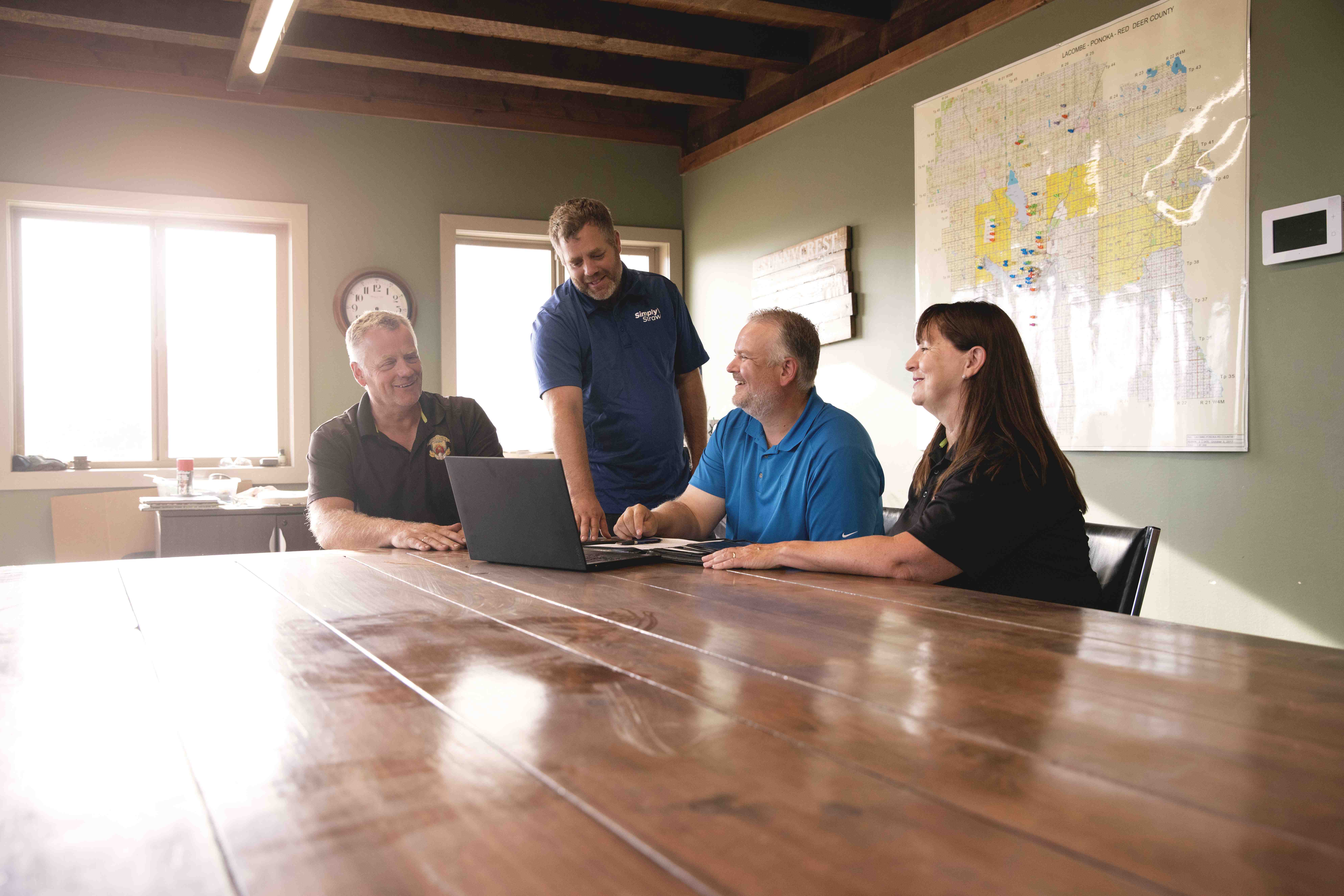 4 people are having a meeting