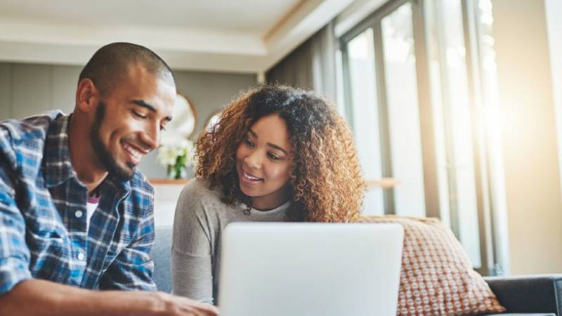 couple looking at laptop