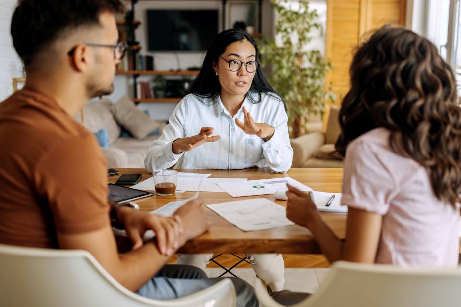 Financial advisor giving advice to clients