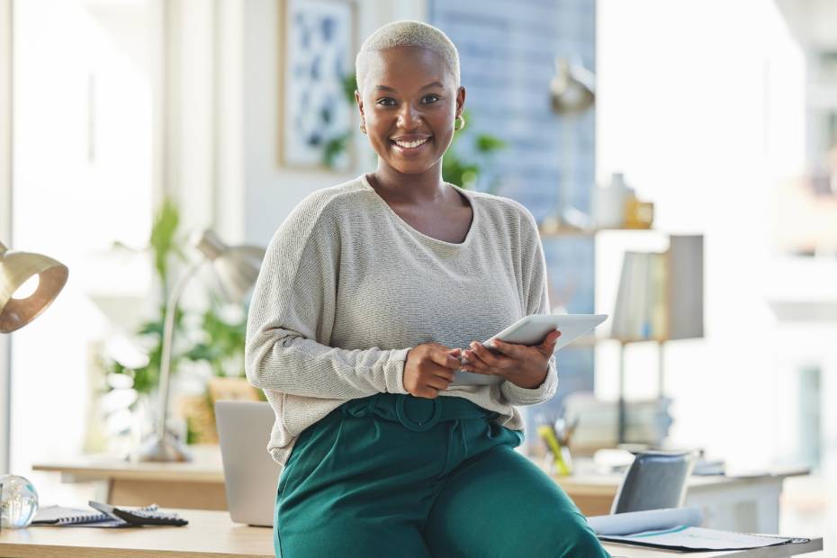 Woman smiling and on her phone