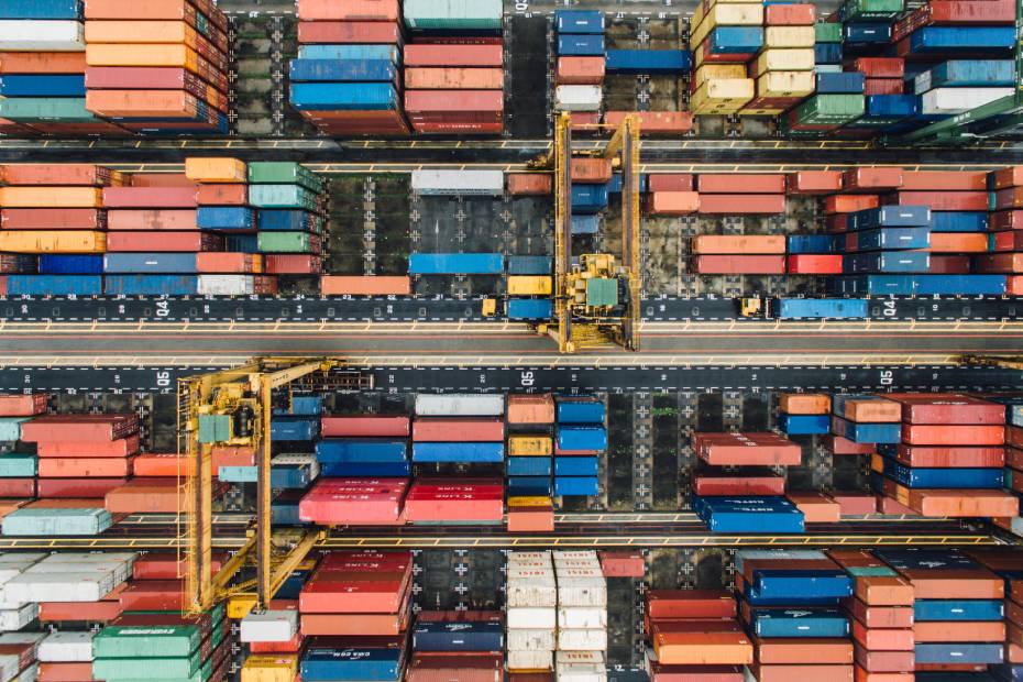 Arial photo of shipping containers representing supply chains