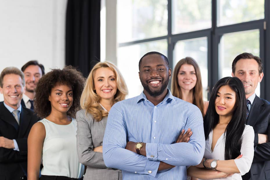 A diverse group of coworkers standing together