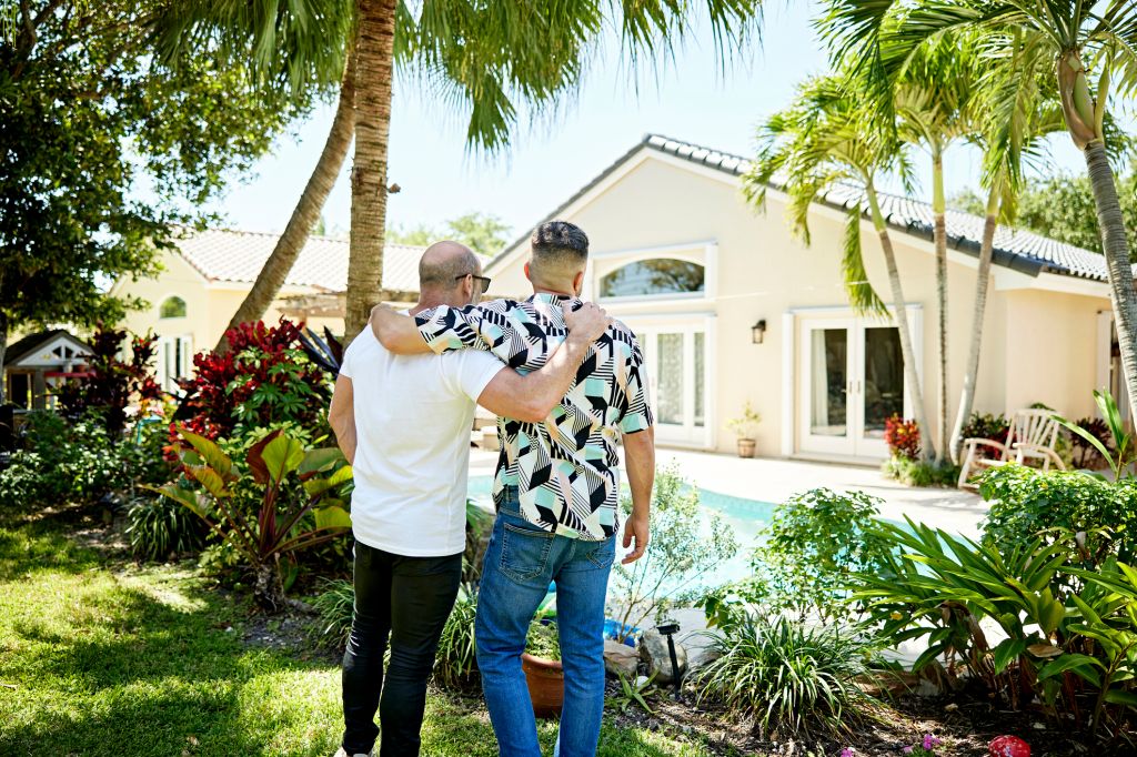 A couple looking at their home