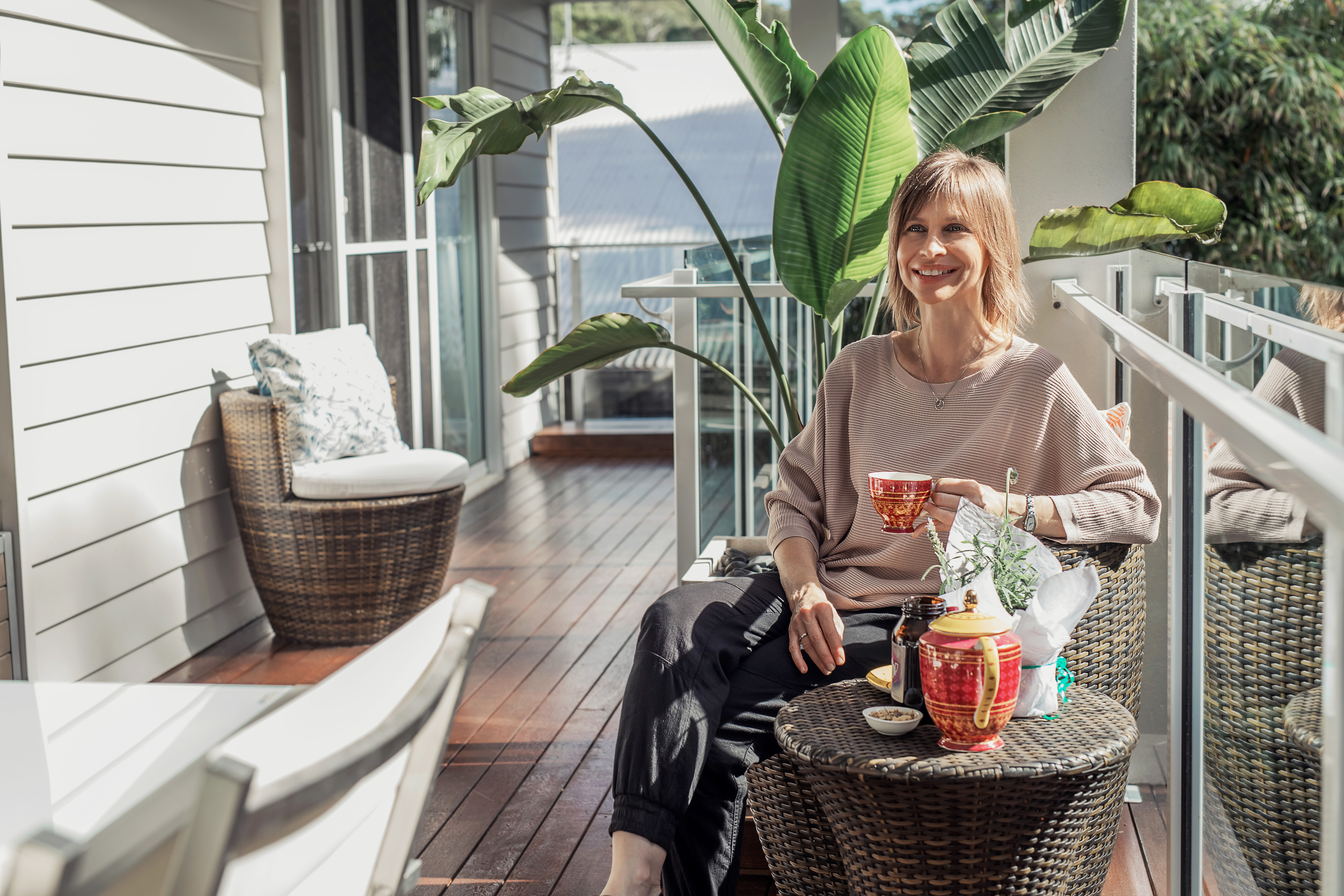 Woman in her patio garden