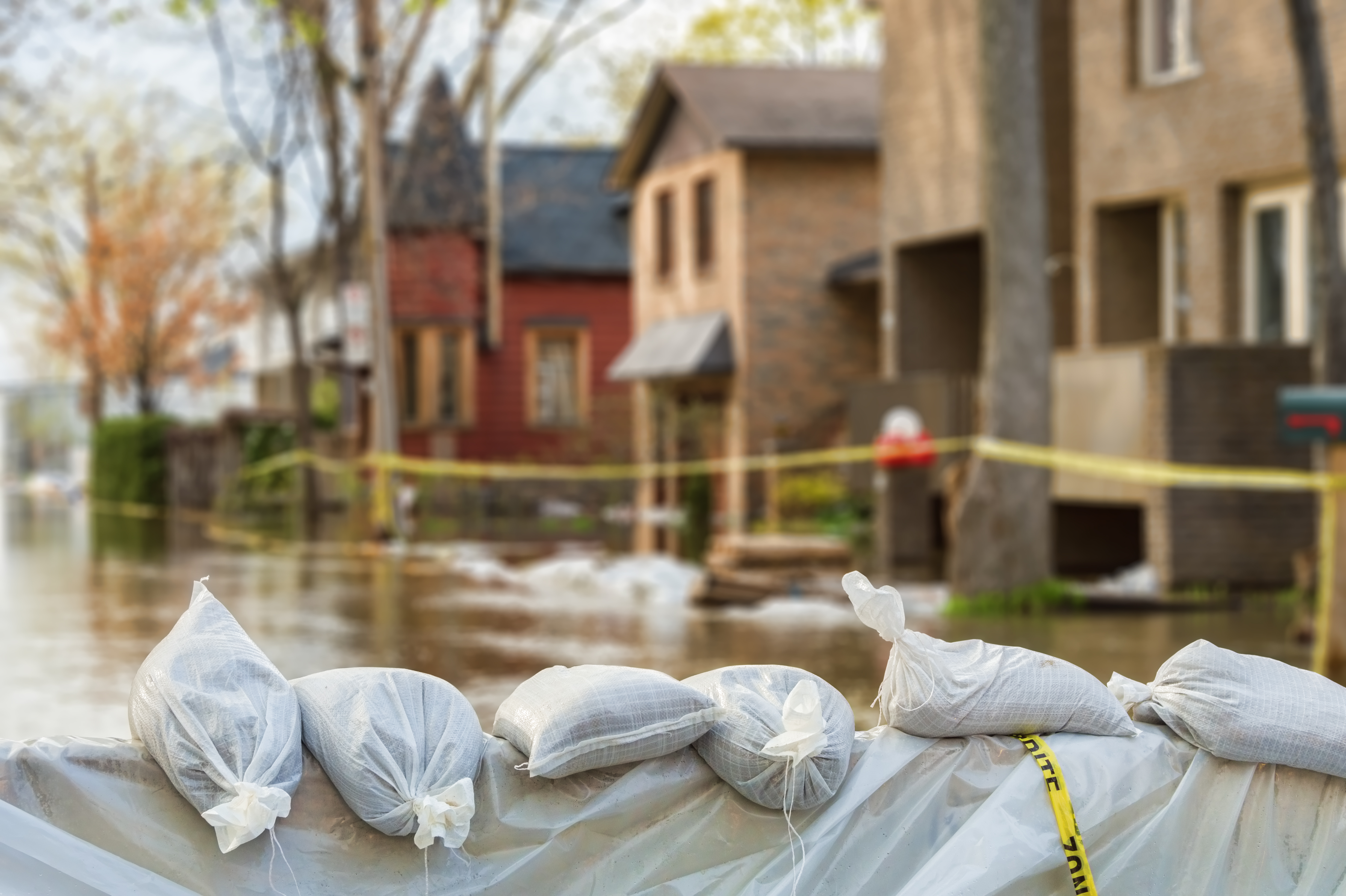 Sandbags act as a flood prevention measure in a suburban neighbourhood