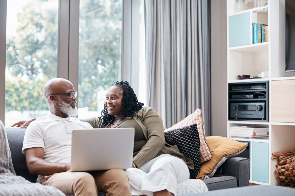 Couple on a couch discussing estate settling