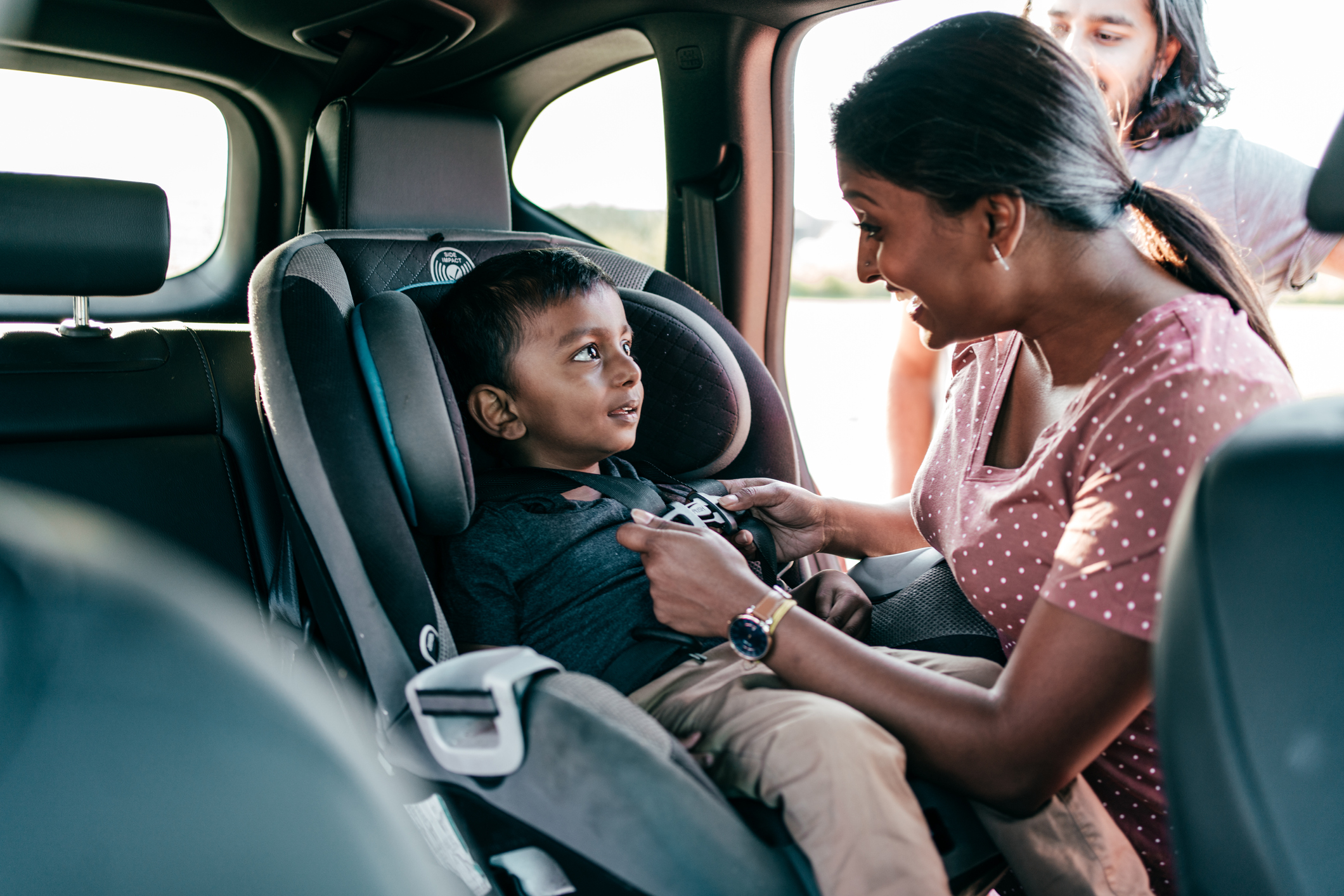 Family with kids using the car