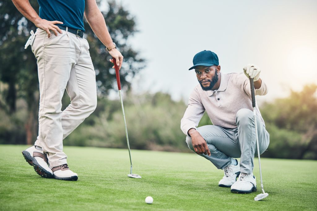 Men golfing