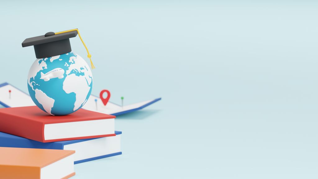 Studying abroad with a graduation cap on a globe