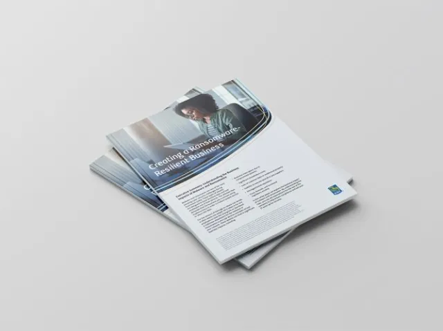A booklet laying down on a white background.