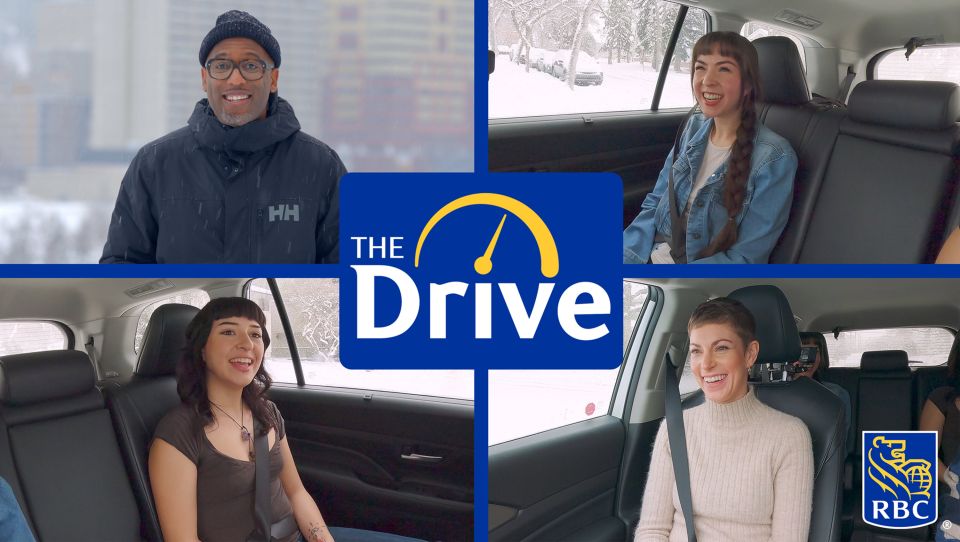 A group of people sitting in a car and talking.