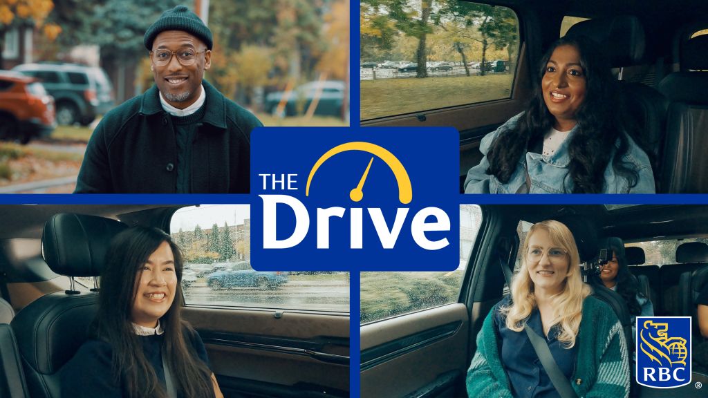 A group of friends smiling and talking to each other in a car.