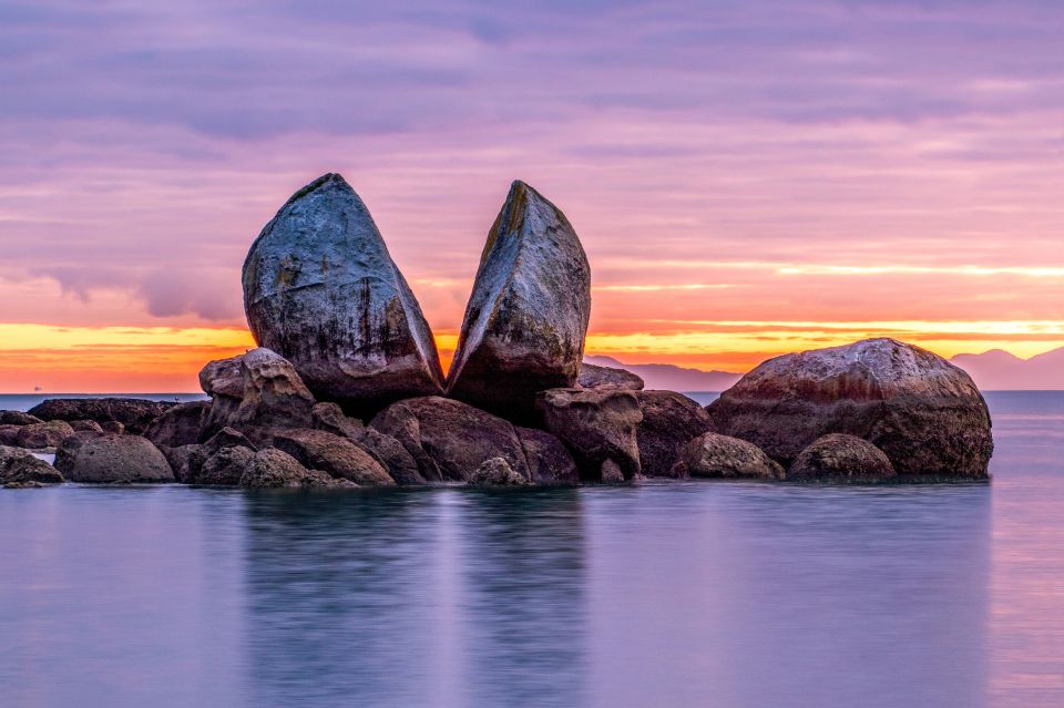 Rock splitting into two that symbolizes the emotional divide of divorce and separation.