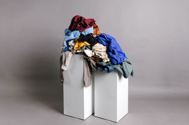 A pile of clothes and textiles ready for sortation. Image courtesy of Debrand.