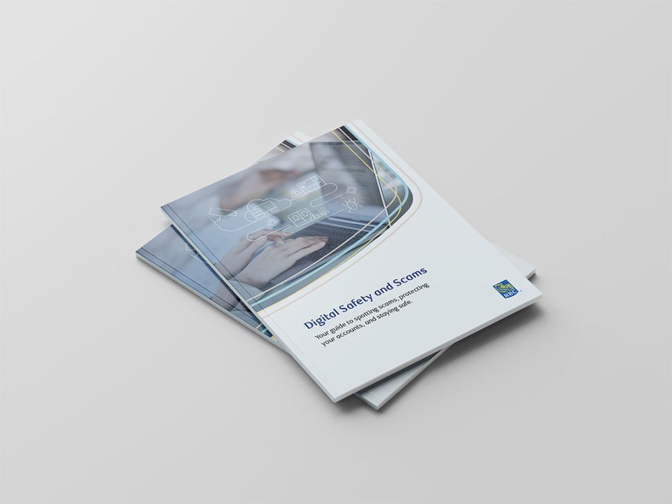 Paperback booklet on a table.