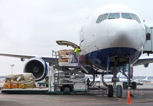 cargo being uploaded on cargo plane