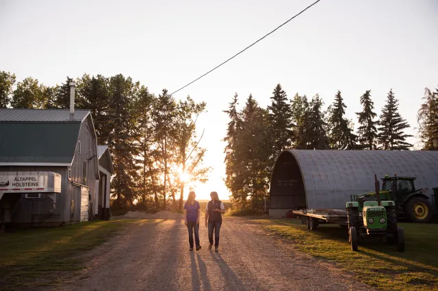 Producers walking through farm