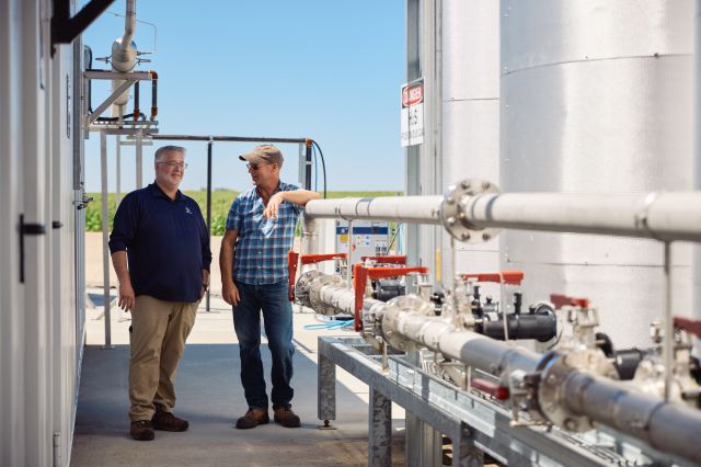 producers overlooking farm operations