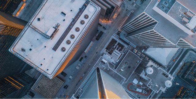 Arial view of office buildings housing Canadian businesses and finance teams.